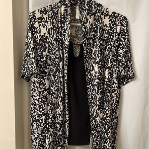 Women’s one piece, short sleeve blouse